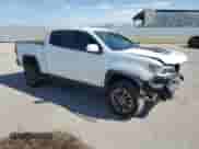 2020 Chevrolet Colorado 4WD ZR2 с VIN 1GCGTEENXL1136643, выставлен на аукционе Copart как лот 67850145 с пробегом 42 818 миль миль и Списание • Salvage title. История ставок и продаж доступна на DreamBid. Изображение 4.