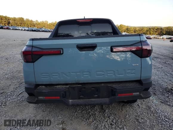 2022 Hyundai Santa Cruz SEL с VIN 5NTJCDAE1NH032013, выставлен на аукционе Copart как лот 76085934 с пробегом 28 824 миль миль и Списание • Salvage title. История ставок и продаж доступна на DreamBid. Изображение 6.