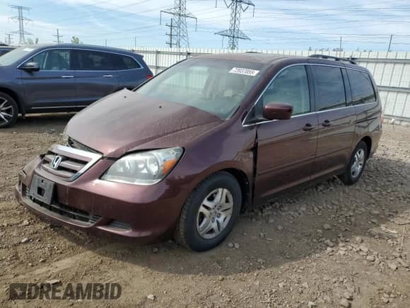 2007 Honda Odyssey EX-L z VIN 5FNRL38647B449329, wystawiony jako Copart lot #72037055 z przebiegiem 201 896 mil mil oraz Szkoda całkowita • Salvage title. Historia ofert i sprzedaży dostępna na DreamBid. Obrazek 1.