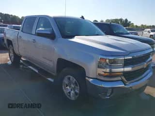 2017 Chevrolet Silverado 1500 LT with VIN 3GCPCREH8HG409895, listed as a IAAI auction lot 43413279 with 127,528 mi miles and . Bid and sale history available at DreamBid. Image 1.