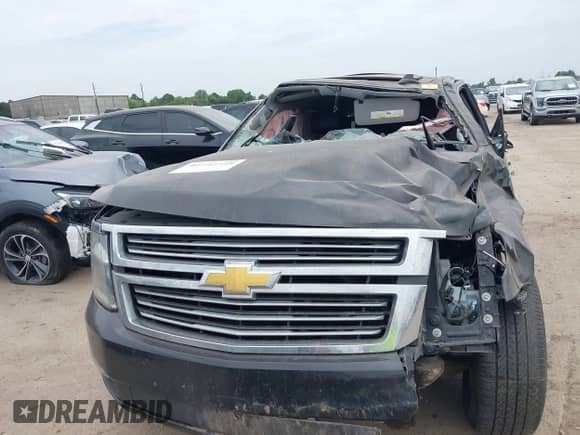 2015 Chevrolet Suburban LTZ с VIN 1GNSKKKC7FR518477, выставлен на аукционе IAAI как лот 42742748 с пробегом Не указан миль и . История ставок и продаж доступна на DreamBid. Изображение 13.