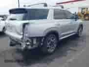 2024 Hyundai Palisade SEL z VIN KM8R4DGE6RU737001, wystawiony jako IAAI lot #43095820 z przebiegiem 8 980 mil mil oraz . Historia ofert i sprzedaży dostępna na DreamBid. Obrazek 4.