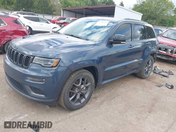 2020 Jeep Grand Cherokee Limited with VIN 1C4RJFBG7LC174779, listed as a IAAI auction lot 43296345 with 102,090 mi miles and . Bid and sale history available at DreamBid. Image 2.