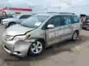 2015 Toyota Sienna LE AAS with VIN 5TDKK3DC5FS568890, listed as a IAAI auction lot 43300989 with 243,285 mi miles and . Bid and sale history available at DreamBid. Image 21.
