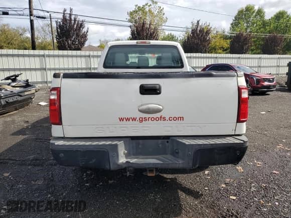 2011 Ford F-250 XL с VIN 1FT7W2A6XBEA32018, выставлен на аукционе Copart как лот 84234285 с пробегом 160 131 миль миль и Списание • Salvage title. История ставок и продаж доступна на DreamBid. Изображение 6.