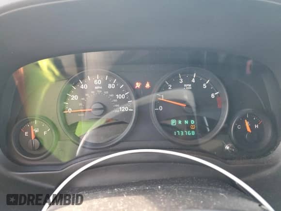 2010 Jeep Compass Sport z VIN 1J4NT1FB3AD641479, wystawiony jako Copart lot #79859594 z przebiegiem 173 768 mil mil oraz Szkoda całkowita • Salvage title. Historia ofert i sprzedaży dostępna na DreamBid. Obrazek 9.
