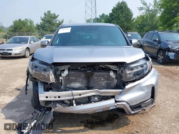 2023 Honda Passport EX-L with VIN 5FNYF8H50PB019594, listed as a IAAI auction lot 42882366 with 26,120 mi miles and . Bid and sale history available at DreamBid. Image 12.