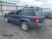 2004 Jeep Grand Cherokee Laredo with VIN 1J4GX48S34C213420, listed as a IAAI auction lot 42221769 with 194,163 mi miles and . Bid and sale history available at DreamBid. Image 3.