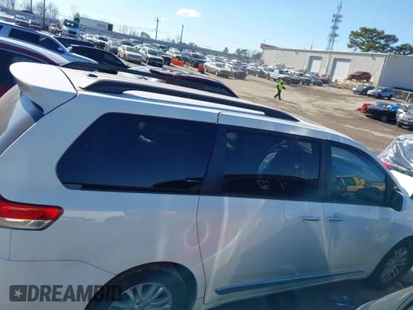 2013 Toyota Sienna XLE AAS with VIN 5TDYK3DC1DS341977, listed as a IAAI auction lot 41418311 with Not provided miles and . Bid and sale history available at DreamBid. Image 12.