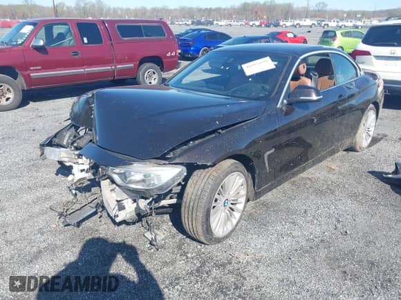 2014 BMW 4 Series 428i with VIN WBA3V7C59EJ872576, listed as a IAAI auction lot 41997699 with Not provided miles and . Bid and sale history available at DreamBid. Image 2.