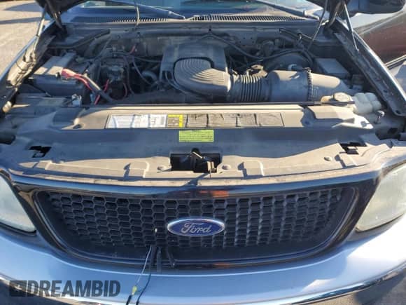 2002 Ford F-150 XL с VIN 2FTRF18W62CA75978, выставлен на аукционе Copart как лот 83978204 с пробегом 103 298 миль миль и Чистый • Clean title. История ставок и продаж доступна на DreamBid. Изображение 11.