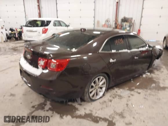 2015 Chevrolet Malibu LTZ with VIN 1G11F5SL0FF203329, listed as a IAAI auction lot 41310725 with 81,968 mi miles and . Bid and sale history available at DreamBid. Image 4.