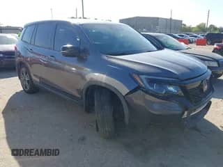 2021 Honda Passport EX-L with VIN 5FNYF7H52MB001975, listed as a IAAI auction lot 43383933 with 59,459 mi miles and . Bid and sale history available at DreamBid. Image 1.