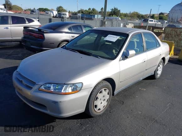 1999 Honda Accord LX with VIN JHMCG6658XC020552, listed as a IAAI auction lot 43553076 with 76,289 mi miles and . Bid and sale history available at DreamBid. Image 6.