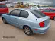 2005 Hyundai Accent GLS z VIN KMHCG35C35U361960, wystawiony jako IAAI lot #43243568 z przebiegiem 163 217 mil mil oraz . Historia ofert i sprzedaży dostępna na DreamBid. Obrazek 3.