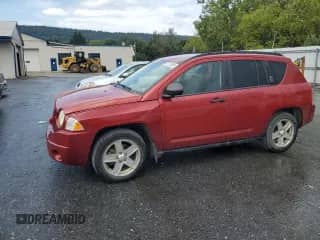 2007 Jeep Compass Sport with VIN 1J8FF47W77D185704, listed as a Copart auction lot 71713205 with 151,742 mi miles and Salvage title. Bid and sale history available at DreamBid. Image 1.