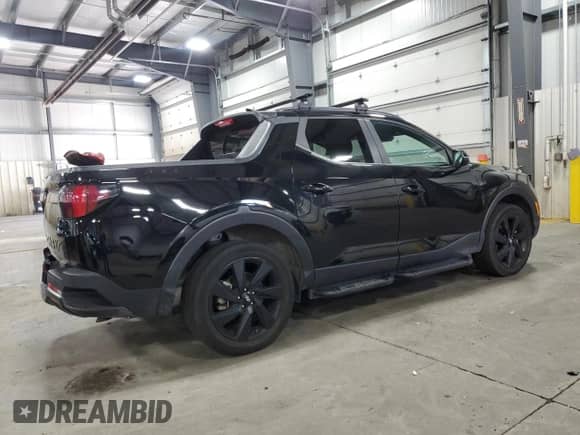 2023 Hyundai Santa Cruz Night Edition с VIN 5NTJCDAF0PH044178, выставлен на аукционе Copart как лот 63587055 с пробегом 24 618 миль миль и Списание • Salvage title. История ставок и продаж доступна на DreamBid. Изображение 3.