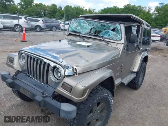 2004 Jeep Wrangler Sahara с VIN 1J4FA59S54P740417, выставлен на аукционе IAAI как лот 42382078 с пробегом 200 108 миль миль и . История ставок и продаж доступна на DreamBid. Изображение 6.