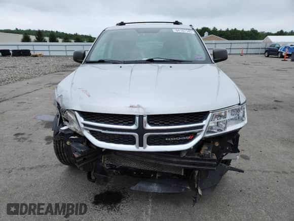 2014 Dodge Journey SE with VIN 3C4PDDAG0ET284651, listed as a Copart auction lot 64187145 with 182,485 mi miles and Salvage title. Bid and sale history available at DreamBid. Image 5.