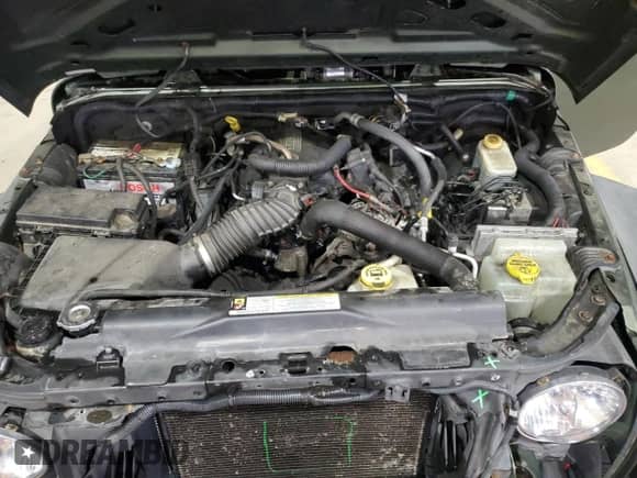 2008 Jeep Wrangler Unlimited X with VIN 1J4GA39158L583789, listed as a Copart auction lot 86292065 with 170,334 mi miles and Salvage title. Bid and sale history available at DreamBid. Image 12.