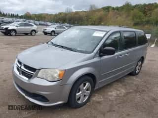 2013 Dodge Grand Caravan SE with VIN 2C4RDGBG6DR687169, listed as a IAAI auction lot 43331501 with 171,185 mi miles and . Bid and sale history available at DreamBid. Image 2.