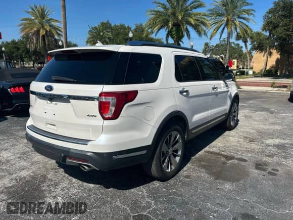 2019 Ford Explorer Limited z VIN 1FM5K8F80KGA52780, wystawiony jako Copart lot #90130305 z przebiegiem 131 865 mil mil oraz Czysty tytuł • Clean title. Historia ofert i sprzedaży dostępna na DreamBid. Obrazek 4.