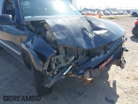 2003 GMC Sierra 1500 SLT z VIN 1GTEK19T03E191705, wystawiony jako IAAI lot #42145392 z przebiegiem Nie podano mil oraz . Historia ofert i sprzedaży dostępna na DreamBid. Obrazek 6.