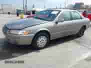 1997 Toyota Camry LE with VIN JT2BG22K9V0023159, listed as a IAAI auction lot 42643720 with 100,412 mi miles and . Bid and sale history available at DreamBid. Image 2.