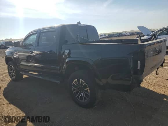 2020 Toyota Tacoma SR with VIN 3TMCZ5AN2LM367400, listed as a Copart auction lot 80845875 with 54,026 mi miles and Salvage title. Bid and sale history available at DreamBid. Image 2.