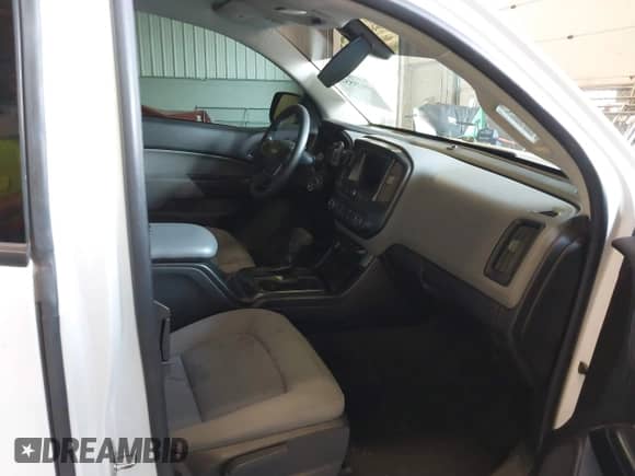 2019 Chevrolet Colorado 2WD Work Truck z VIN 1GCHSBEN7K1158829, wystawiony jako IAAI lot #40285519 z przebiegiem 71 550 mil mil oraz . Historia ofert i sprzedaży dostępna na DreamBid. Obrazek 5.