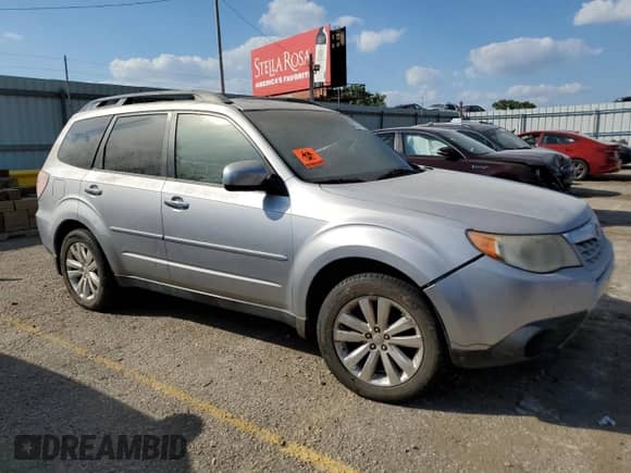 2013 Subaru Forester X Premium с VIN JF2SHADC8DH412333, выставлен на аукционе Copart как лот 84029405 с пробегом 158 130 миль миль и Списание • Salvage title. История ставок и продаж доступна на DreamBid. Изображение 4.