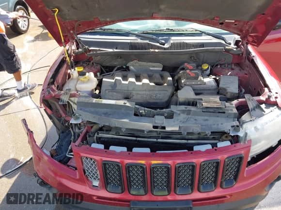 2014 Jeep Compass Latitude with VIN 1C4NJCEB4ED651713, listed as a IAAI auction lot 43305790 with 139,289 mi miles and . Bid and sale history available at DreamBid. Image 10.