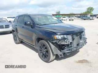 2020 Jeep Grand Cherokee Altitude with VIN 1C4RJEAG7LC113752, listed as a IAAI auction lot 42529528 with 104,723 mi miles and . Bid and sale history available at DreamBid. Image 1.