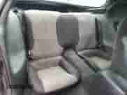 1994 Chevrolet Camaro Z28 z VIN 2G1FP22P4R2105947, wystawiony jako Copart lot #85064294 z przebiegiem 131 315 mil mil oraz Szkoda całkowita • Salvage title. Historia ofert i sprzedaży dostępna na DreamBid. Obrazek 10.