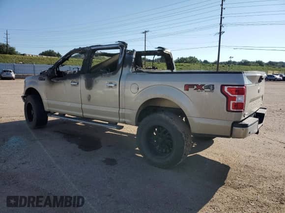 2018 Ford F-150 XL с VIN 1FTEW1EG7JKE06301, выставлен на аукционе Copart как лот 71099925 с пробегом Не указан миль и Списание • Salvage title. История ставок и продаж доступна на DreamBid. Изображение 2.