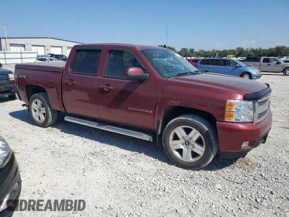 2008 Chevrolet Silverado 1500 LTZ with VIN 2GCEK13M981152864, listed as a Copart auction lot 80639885 with 136,829 mi miles and Salvage title. Bid and sale history available at DreamBid. Image 4.
