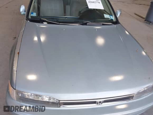 1992 Honda Accord LX with VIN JHMCB7658NC016387, listed as a IAAI auction lot 42682778 with 113,566 mi miles and . Bid and sale history available at DreamBid. Image 6.