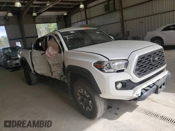 2023 Toyota Tacoma TRD Off Road z VIN 3TMCZ5AN5PM625110, wystawiony jako Copart lot #82304995 z przebiegiem 48 416 mil mil oraz Szkoda całkowita • Salvage title. Historia ofert i sprzedaży dostępna na DreamBid. Obrazek 4.