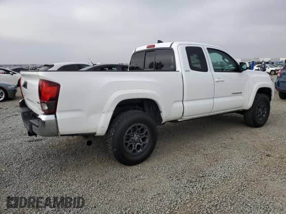 2018 Toyota Tacoma SR5 with VIN 5TFRZ5CN9JX062460, listed as a Copart auction lot 52949375 with 79,458 mi miles and Salvage title. Bid and sale history available at DreamBid. Image 3.