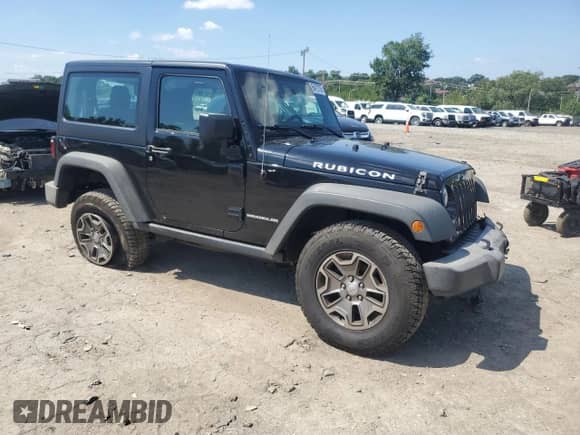 2016 Jeep Wrangler Rubicon with VIN 1C4BJWCG4GL302918, listed as a Copart auction lot 66472705 with 128,138 mi miles and Salvage title. Bid and sale history available at DreamBid. Image 4.