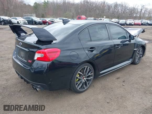 2020 Subaru WRX STI with VIN JF1VA2E6XL9818207, listed as a IAAI auction lot 41929778 with 33,363 mi miles and . Bid and sale history available at DreamBid. Image 4.