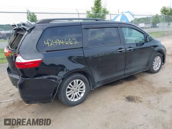 2016 Toyota Sienna XLE with VIN 5TDYK3DC9GS706815, listed as a IAAI auction lot 42494662 with 141,157 mi miles and . Bid and sale history available at DreamBid. Image 4.