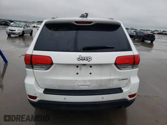 2018 Jeep Grand Cherokee Laredo z VIN 1C4RJEAG3JC175243, wystawiony jako Copart lot #52092485 z przebiegiem Nie podano mil oraz Nie do naprawy • Non repairable. Historia ofert i sprzedaży dostępna na DreamBid. Obrazek 6.