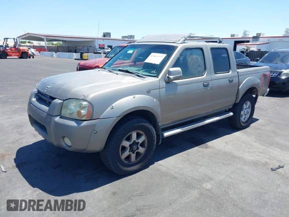 2003 Nissan Frontier XE with VIN 1N6ED27Y63C412604, listed as a IAAI auction lot 42892777 with 235,122 mi miles and . Bid and sale history available at DreamBid. Image 2.