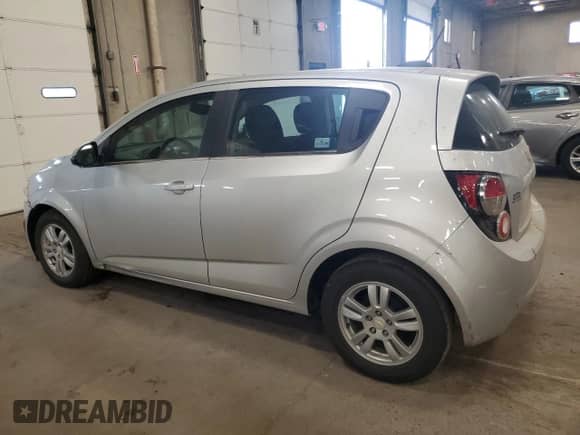 2016 Chevrolet Sonic LT with VIN 1G1JC6SB5G4182464, listed as a Copart auction lot 80868175 with 14,855 mi miles and Salvage title. Bid and sale history available at DreamBid. Image 2.