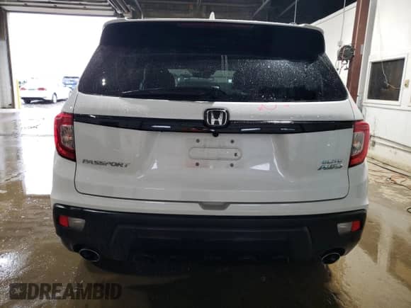2021 Honda Passport Elite с VIN 5FNYF8H00MB000298, выставлен на аукционе Copart как лот 59617995 с пробегом 48 033 миль миль и Списание • Salvage title. История ставок и продаж доступна на DreamBid. Изображение 6.