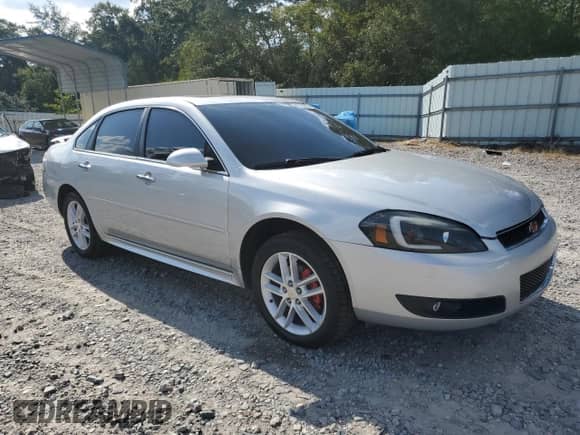 2012 Chevrolet Impala LTZ with VIN 2G1WC5E31C1108162, listed as a Copart auction lot 82126595 with 155,455 mi miles and Salvage title. Bid and sale history available at DreamBid. Image 4.