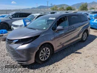 2021 Toyota Sienna LE with VIN 5TDKSKFC8MS011427, listed as a Copart auction lot 58518425 with 49,301 mi miles and Salvage title. Bid and sale history available at DreamBid. Image 1.