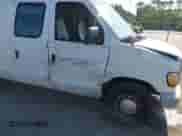 1999 Ford Econoline Cargo with VIN 1FTRE1420XHA34056, listed as a IAAI auction lot 41998411 with 236,267 mi miles and . Bid and sale history available at DreamBid. Image 6.