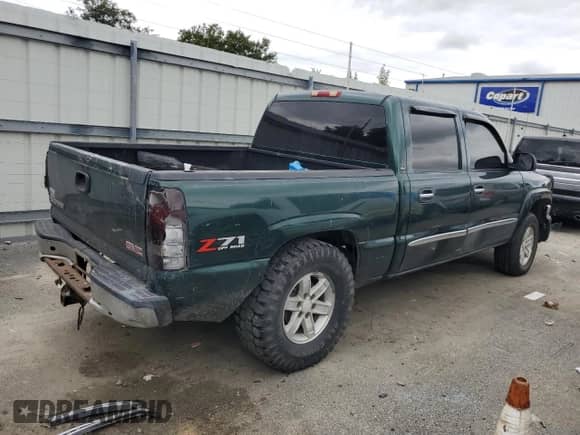 2007 GMC Sierra 1500 SLT with VIN 2GTEK13ZX71149336, listed as a Copart auction lot 67743045 with 324,469 mi miles and Salvage title. Bid and sale history available at DreamBid. Image 3.